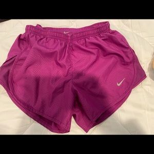 Nike xs purple fuchsia color